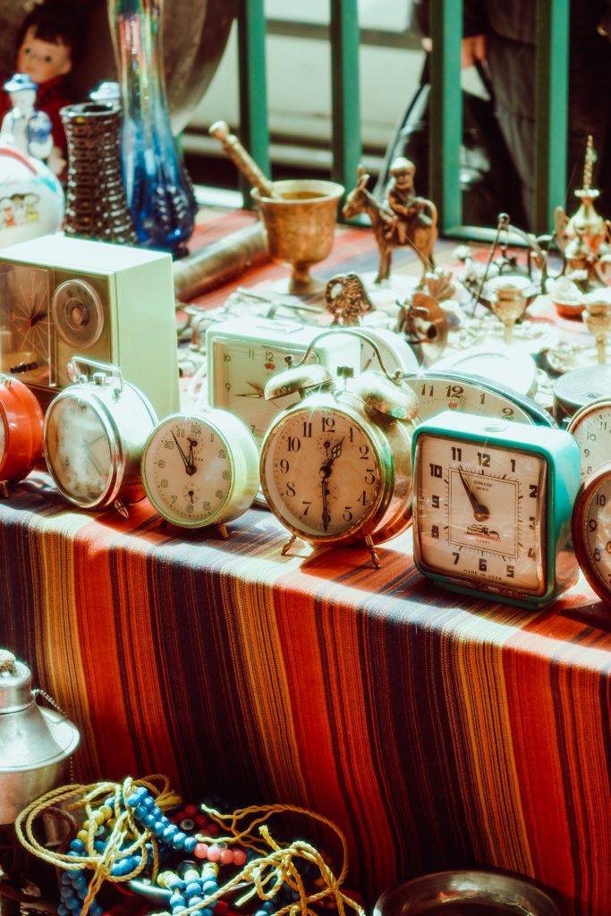 Shelves of small painted keepsakes and trinkets in a souvenir shop