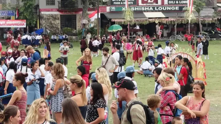 Visitors gathered on the lawn at an Ubud food festival